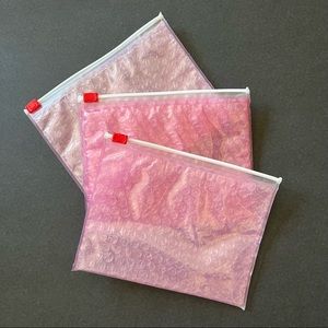 GLOSSIER POUCHES
